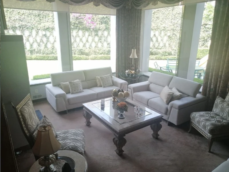 Sala con vista al jardín Lomas de las Palmas